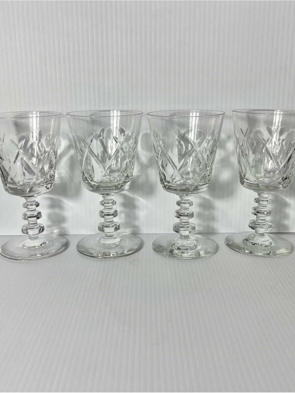 Set of Four Rock Sharpe Olive and Cross Footed Water / Wine Goblets